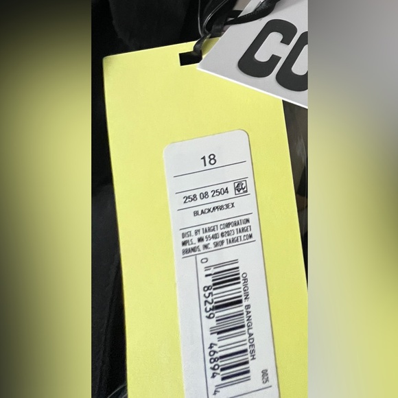 Sleeveless black mini dress with gold ring detailing - Picture 8 of 9